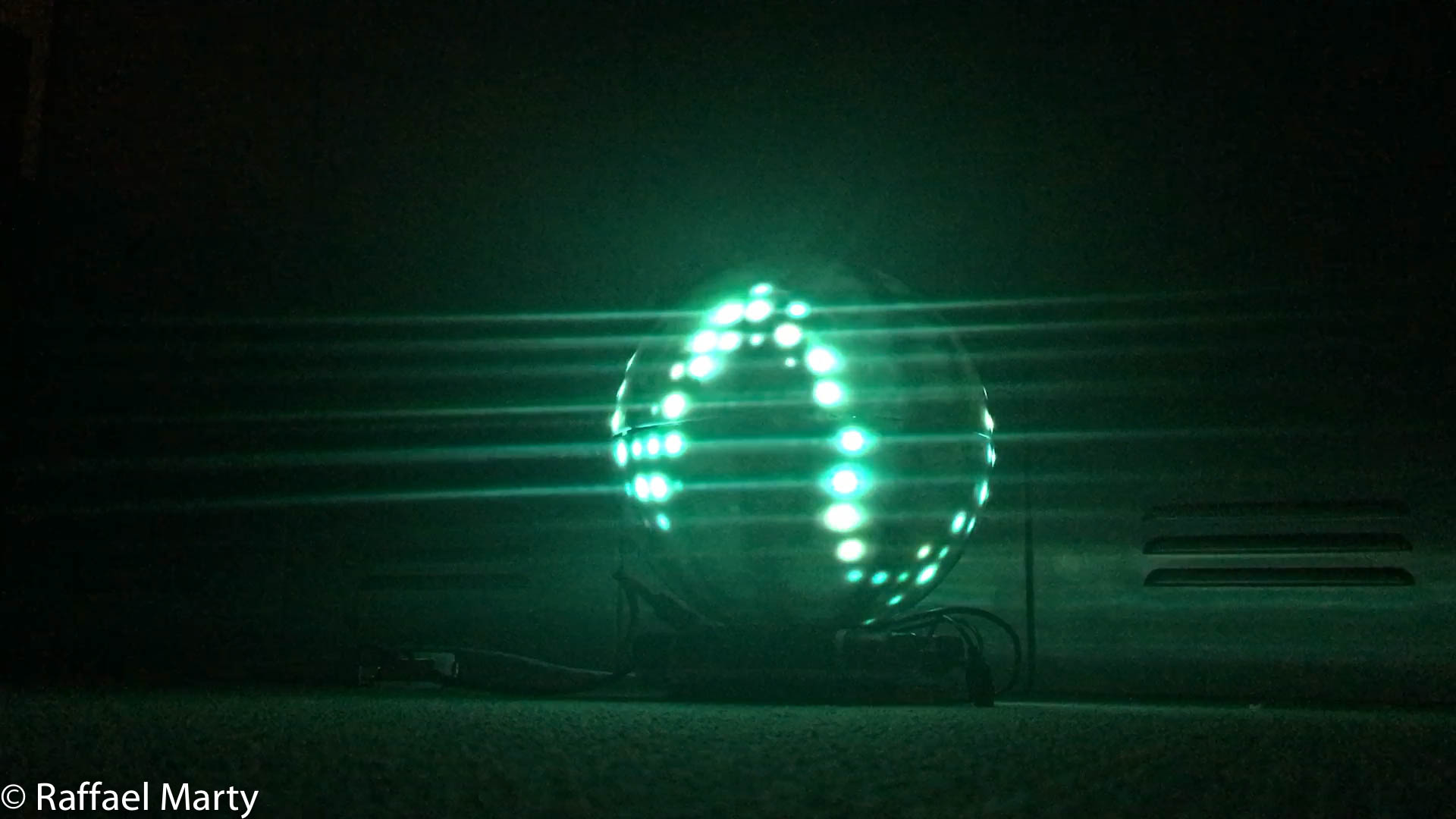 Finished orb lit in green and blue